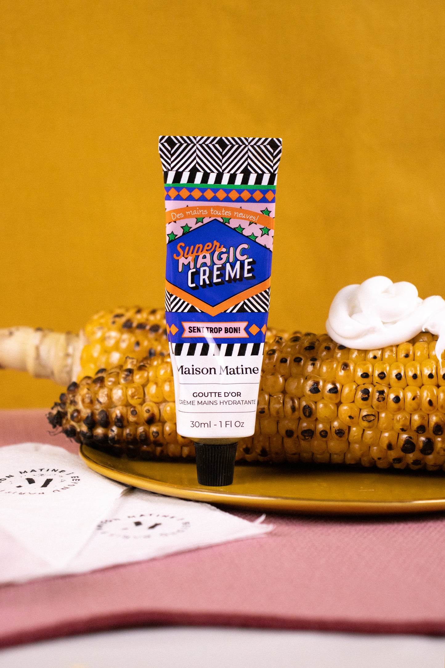 GOUTTE D'OR hand cream de Maison Matine con bote de colores azul, rosa, blanco y negro