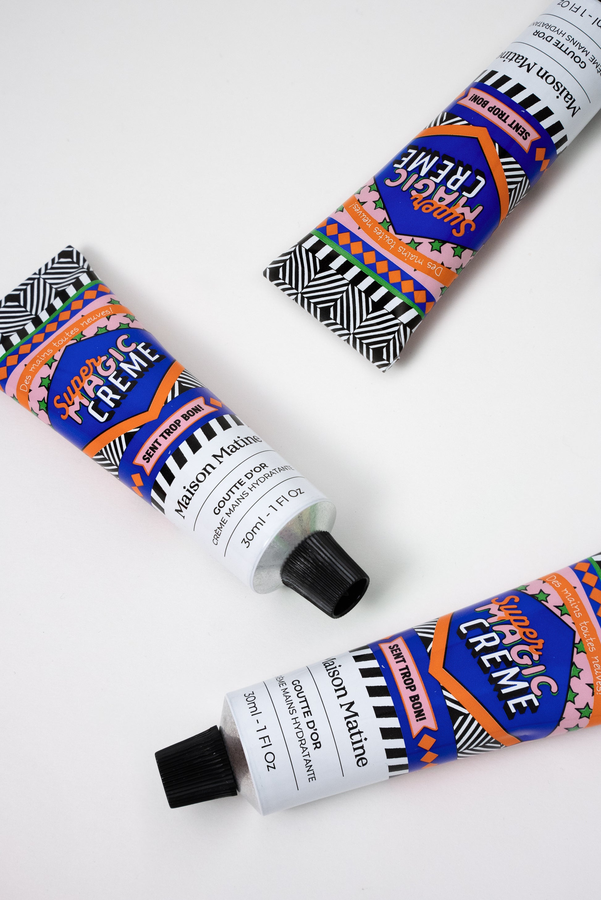 GOUTTE D'OR hand cream de Maison Matine con bote de colores azul, rosa, blanco y negro