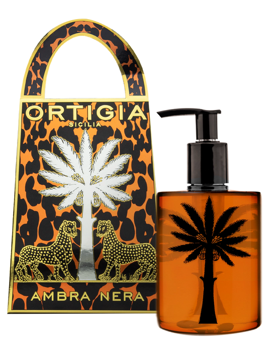 Frasco y estuche del perfume Ortigia Sicilia Ambra Nera con diseño de palmera y leopardo color dorado
