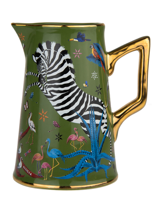 Taza con diseño de cebra y animales coloridos sobre fondo verde, acompañada de una caja a juego de la marca Ortigia Sicilia