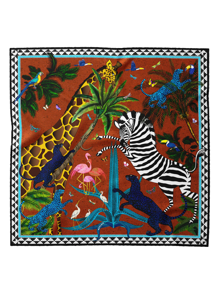 foulard con fondo color rojo teja y jirafa y zebra y palmeras en seda de Ortigia Sicilia