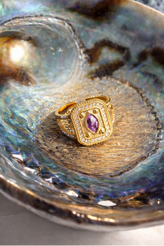 Gold rectangular ring with a lilac gemstone  by ortigas rosas