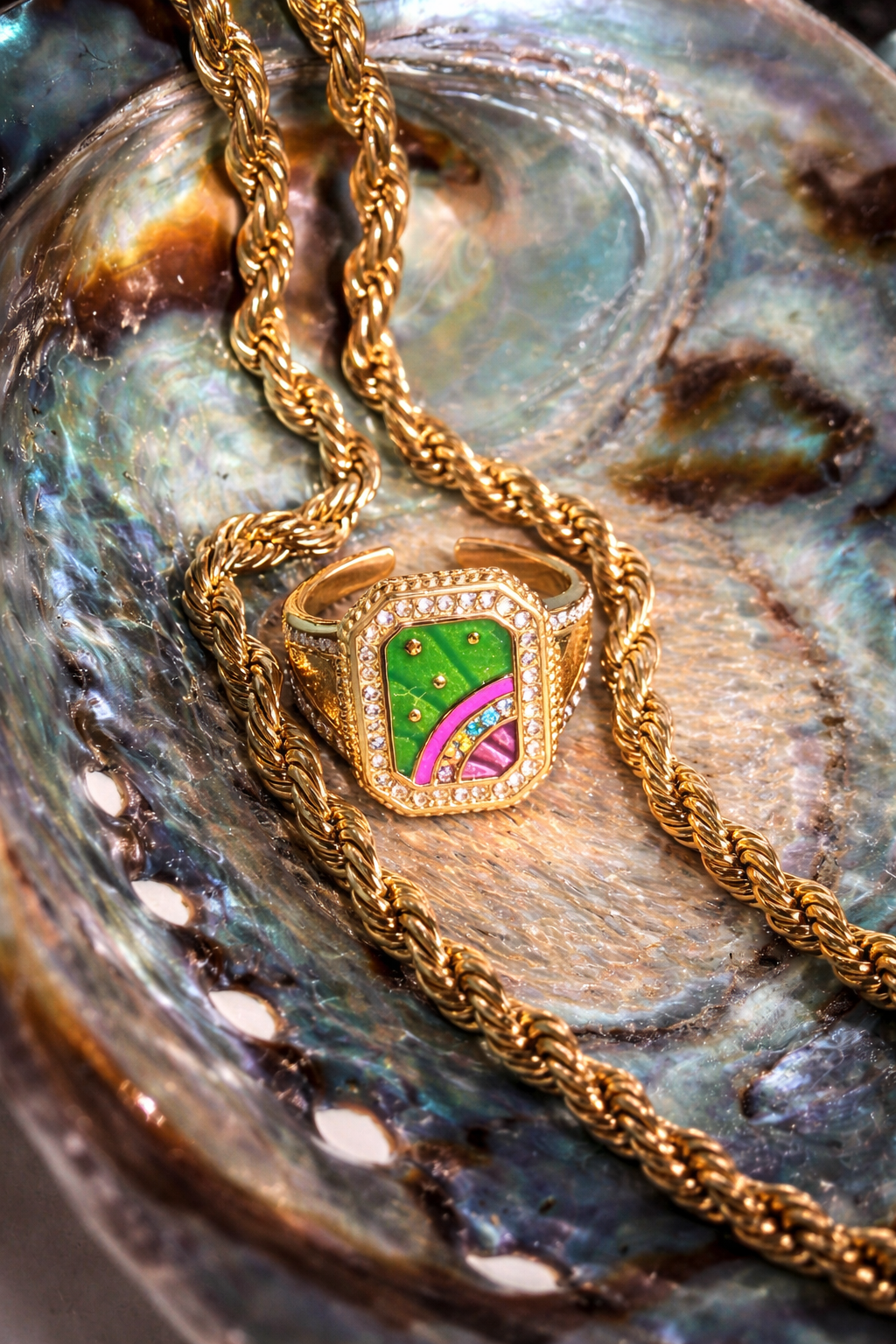 Gold ring with colorful gemstones in the shape of a rainbow with colorful crystals by ortigas rosas