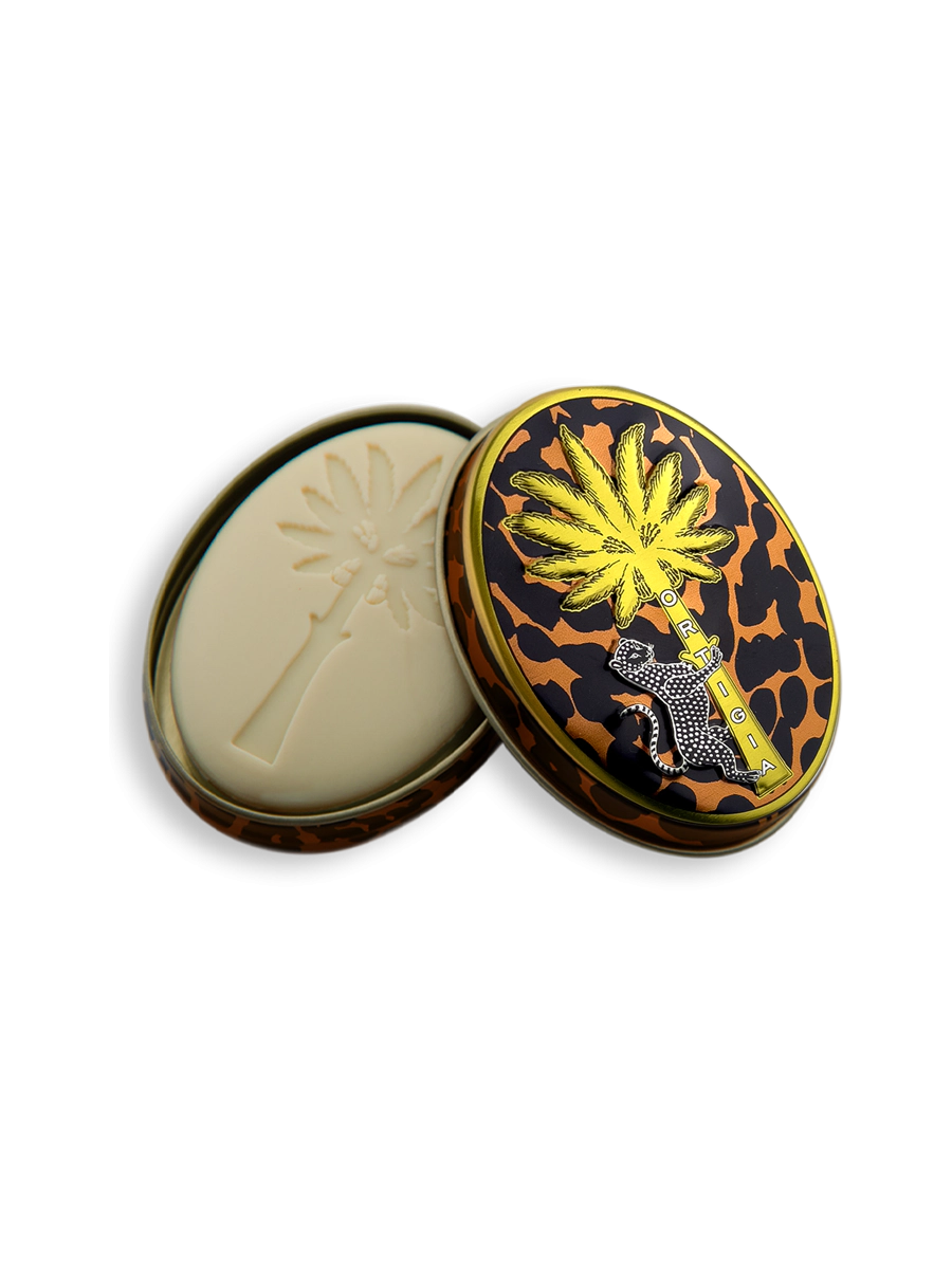 Compact mirror with decorative lid featuring a palm tree and panther design on a white background