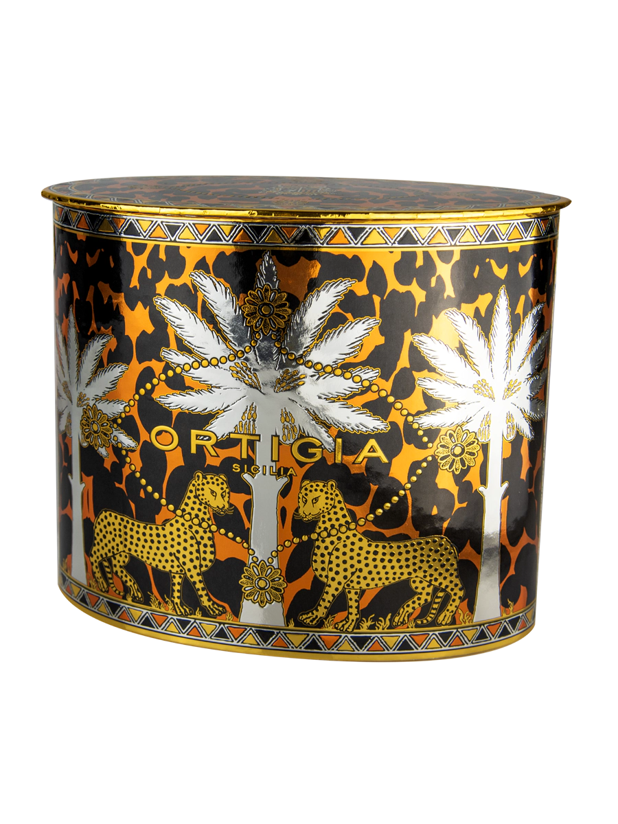 caja color dorado y negro con estampado animalier con palmera color plata y leopardos y jabon liquido color marron y palmera y leopardos y vela y jabon y crema manos