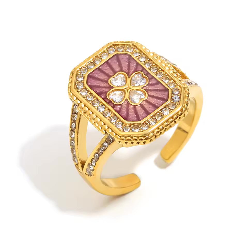 Gold ring with a pink clover design with crystals by ortigas rosas