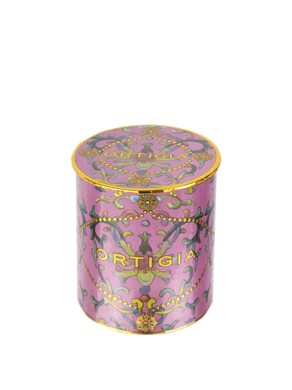Decorative pink candle Aragona with gold accents and 'Ortigia' branding on a white background