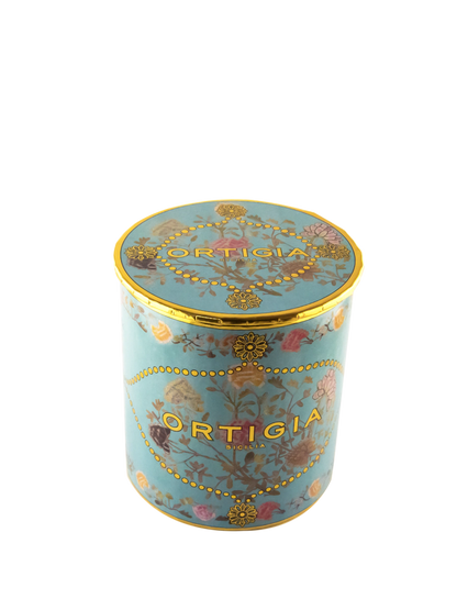 Vela decorativa Florio de Ortigia Sicilia en color turquesa con detalles en dorado y flores. Caja redonda con tapa dorada 