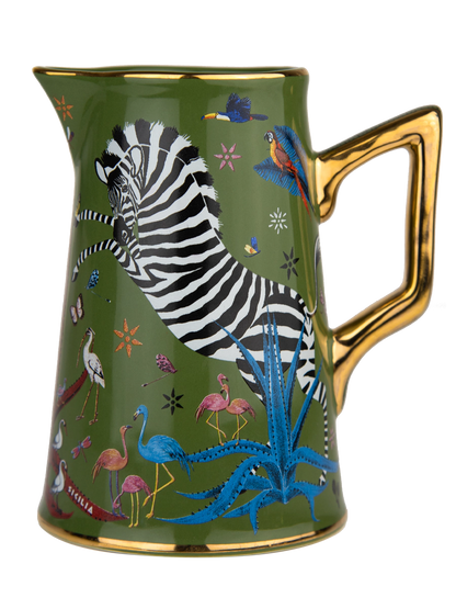 Taza con diseño de cebra y animales coloridos sobre fondo verde, acompañada de una caja a juego de la marca Ortigia Sicilia
