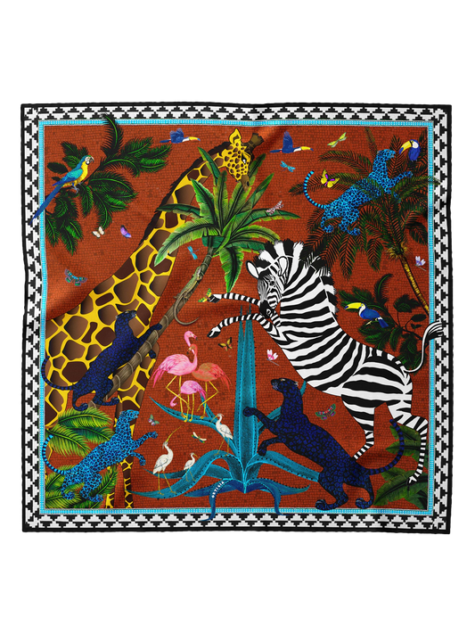 foulard con fondo color rojo teja y jirafa y zebra y palmeras en seda de Ortigia Sicilia